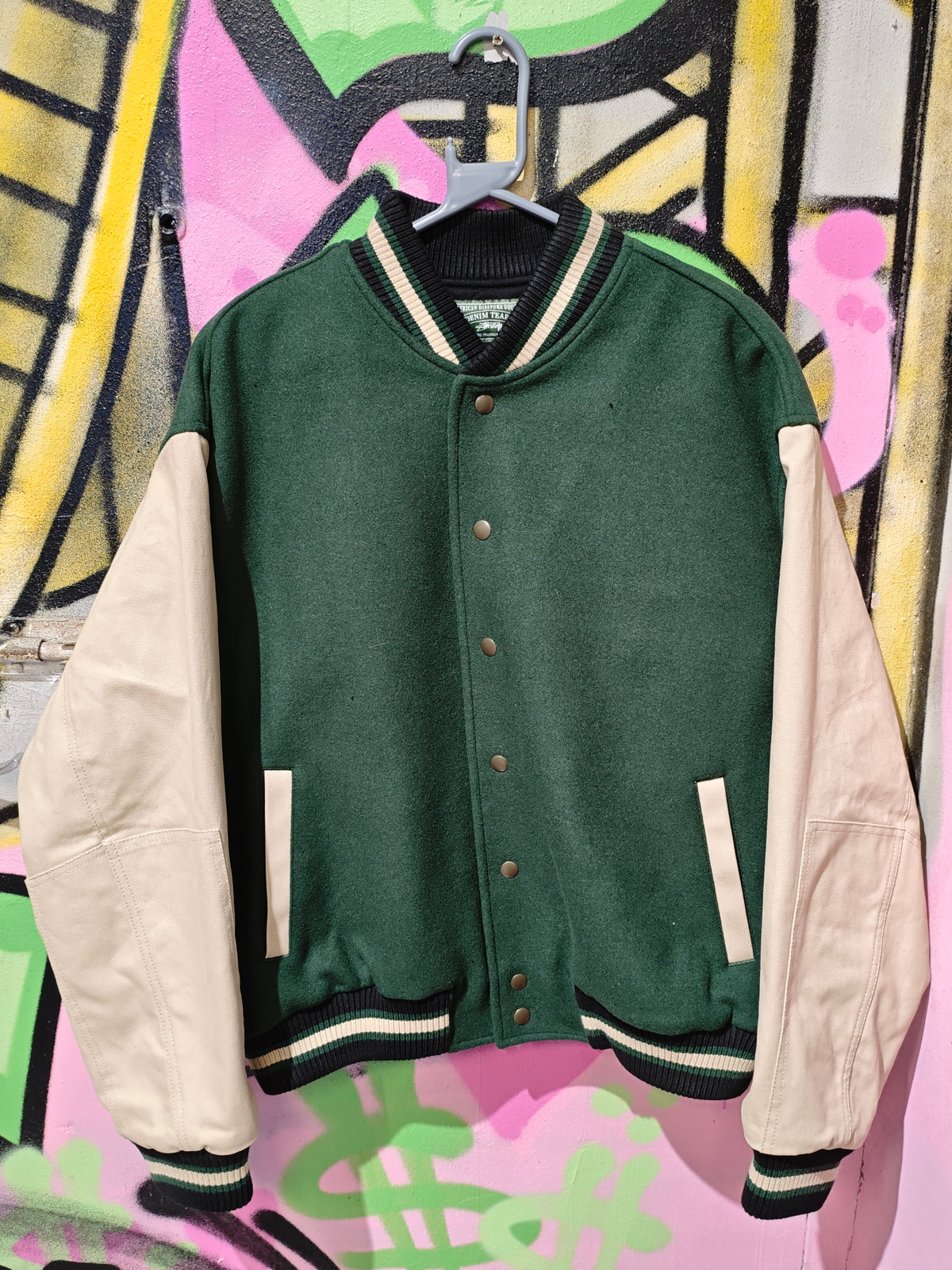 Stüssy and Denim Tears Green & Cream Varsity Jacket